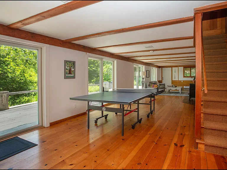 Ping Pong table showing sliding doors in lower level