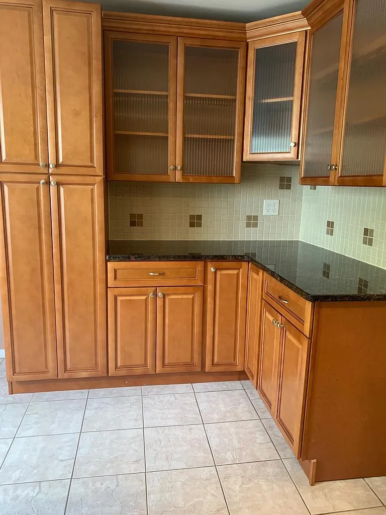 Second Level - Kitchen second half complete with large china cabinets, double pantry and additional counter space. - 721 Stony Brook Way
