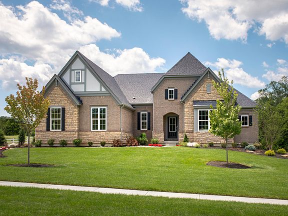 Custom one-story brick and stone home