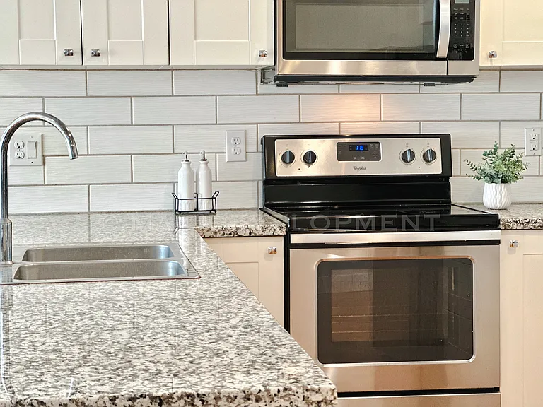 White Wavy Subway Tile Backsplash