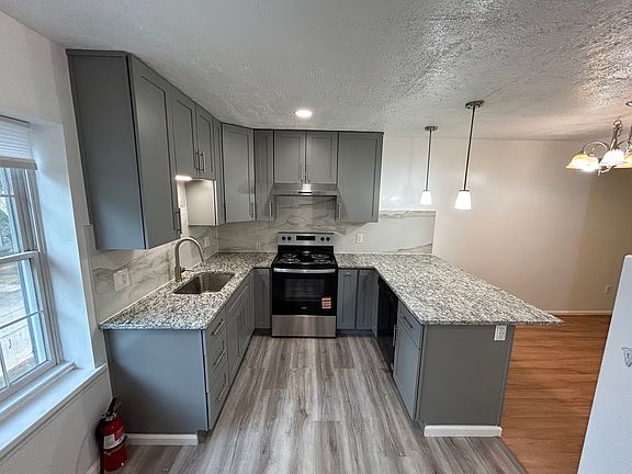 Newly renovated kitchen with new stove range