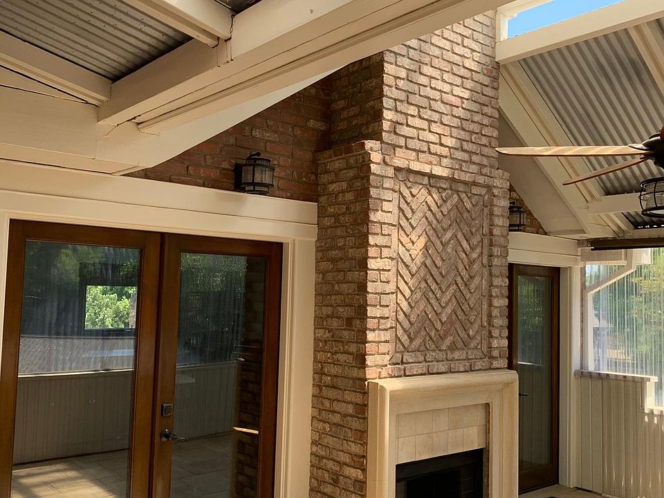 Entry deck stone flooring indoor out door fireplace