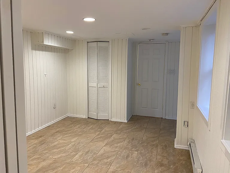 Bedroom looking towards front of apartment.