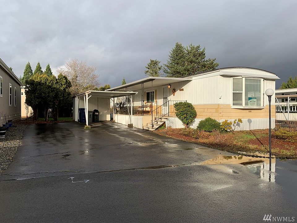 This clean, well maintained and beautifully updated home has a covered parking spot plus room for at least three more cars.