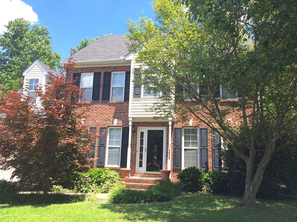 Gorgeous Landscape, with Flowering Cherry tree, Japanese Maples, and Hibiscus, as well as a small raised veggie garden-bed! Recently mulched+seeded to prepare for new tenants!