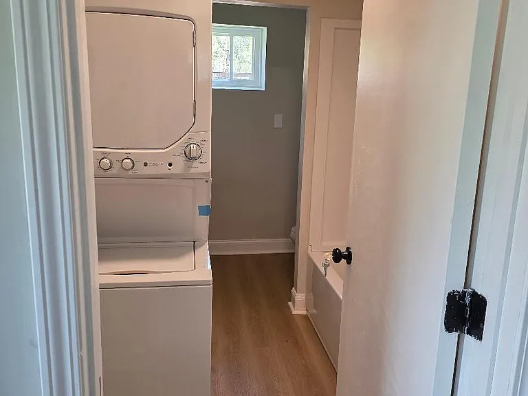 Stackable washer and dryer provided installed in the 1st floor bathroom