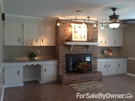 Wood Burning Fireplace
						:
						Great Room looking toward fireplace with granite and built in cabinets/desk