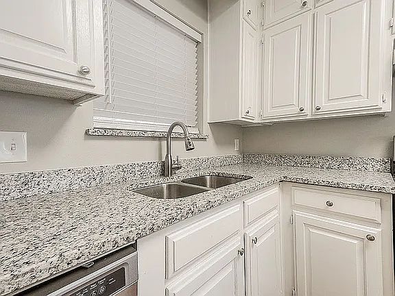 Kitchen granite countertops and fresh paint throughout