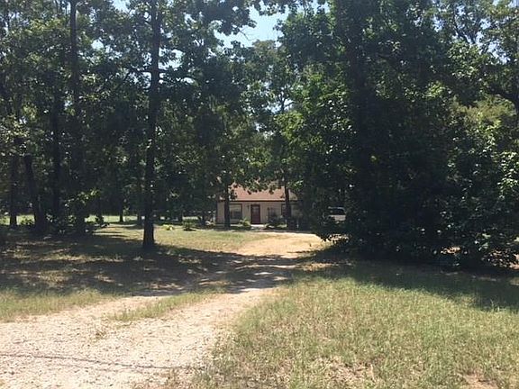 Front of the 1.48 acres looking at the home from the street.
