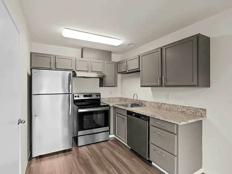 Updated kitchen with stainless steel appliances, ample cabinet storage, and modern finishes in this University Place apartment. Updated kitchen with stainless steel appliances, ample cabinet storage, and modern finishes in this University Place apartment.