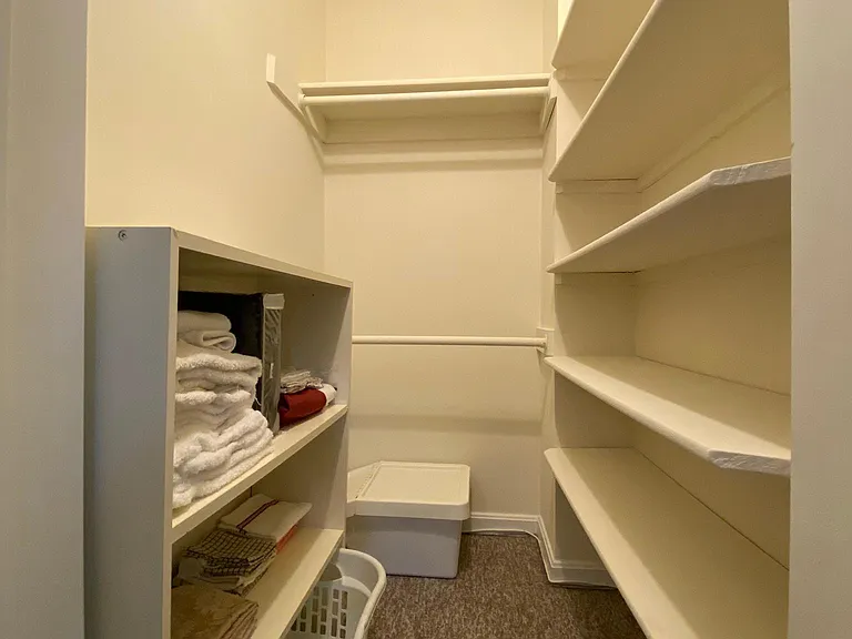 Walk in closet in bedroom