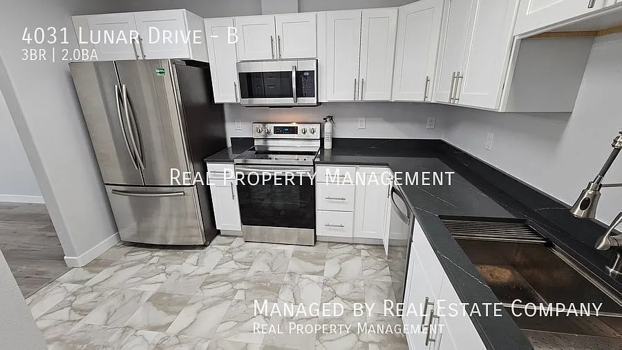 Fully Remodeled Three Bed Two Bath Townhome Near U-Med District — Photo 4