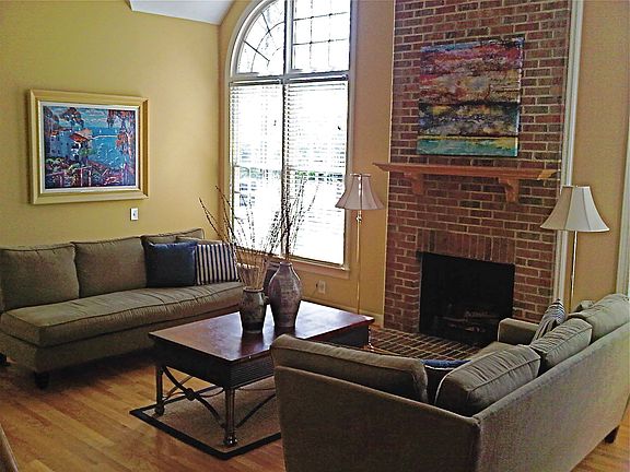 Family Room Also Has View of the Golf Course and Plantation Shutter