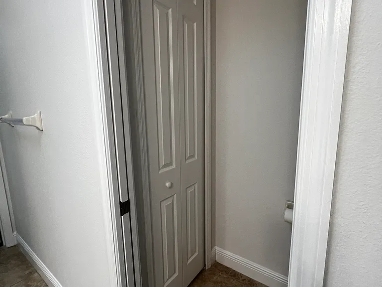 Linen Closet/Master Bathroom Toilet Room