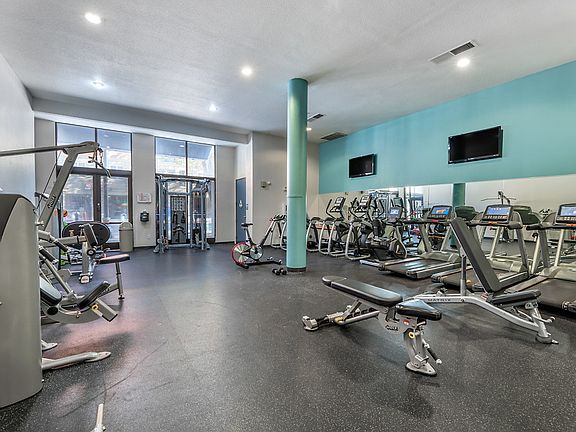 Fitness center with cardio and strength training equipment