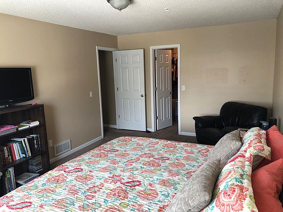Large master bedroom with a very generous walk-in closet