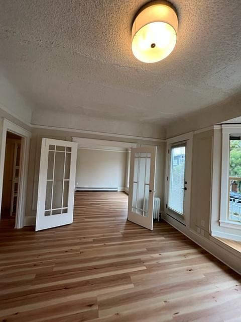 French doors between Living room and bedroom