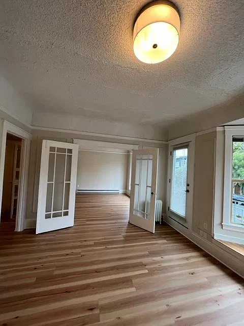 French doors between Living room and bedroom