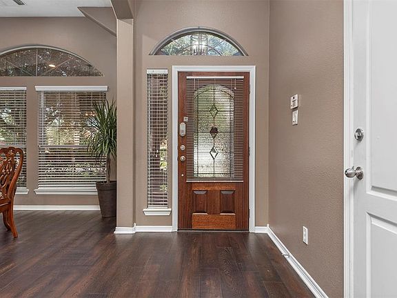 The elegant front entry and dining room provide a wow factor as soon as you walk in the door.