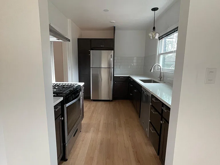 Kitchen, brand new appliances, cabinets, and backsplash