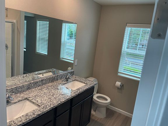 Master Bath has two sinks, walk in shower, and walk-in closet