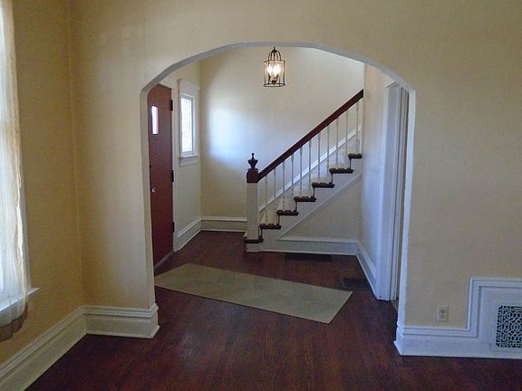 Foyer with period staircase