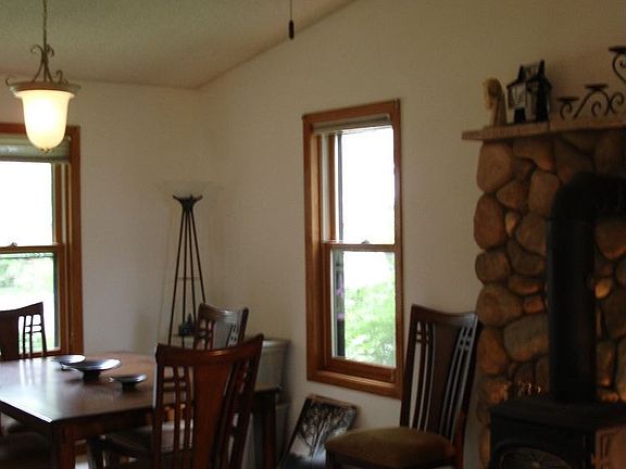 Vaulted Family / Great Room with Wood Burning Stove and Ceiling Fan