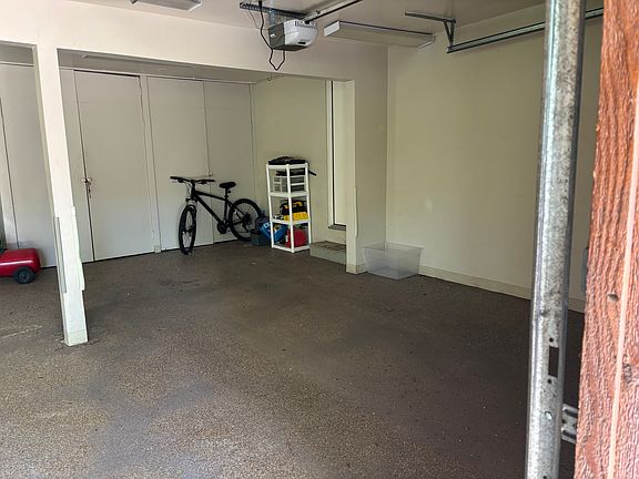 Garage offers direct entry into cottage, storage area and room for bicycle, etc.