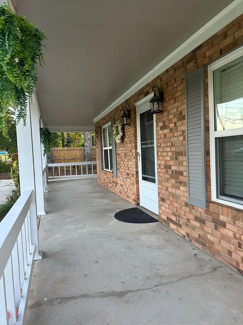 Move-In Ready Corner-Lot Home with Wraparound Porch Near Fort Eisenhower — Photo 2