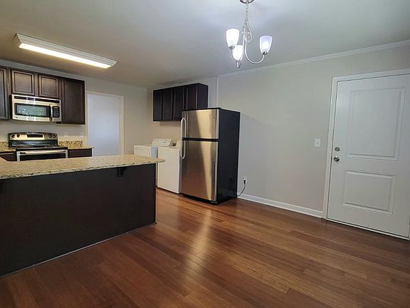 Kitchen with Laundry Area