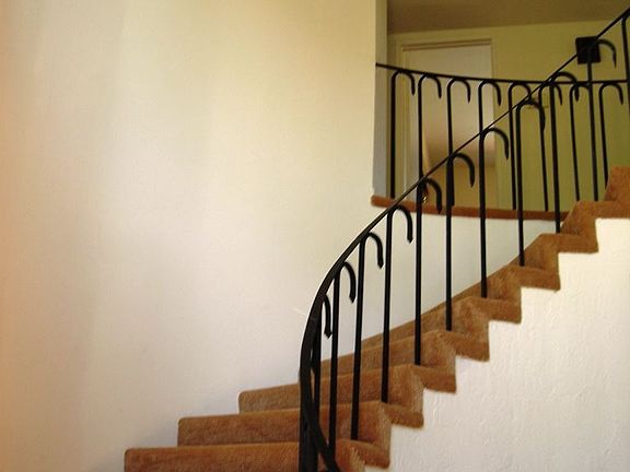 Spiral Stairways in Foyer w/volume ceilings