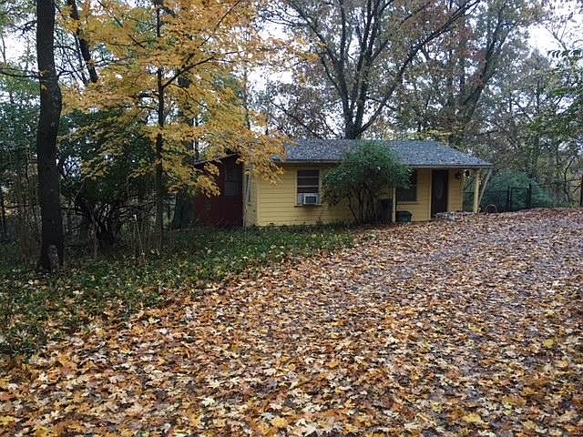 private quiet road on Mount Sequoyah. Only one more home be
