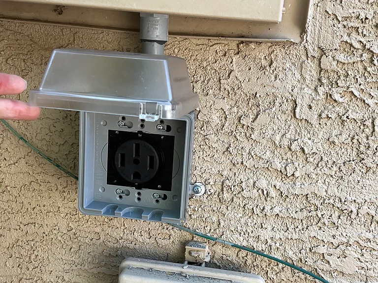 electric car charger ready for short or long cord provided by tenant