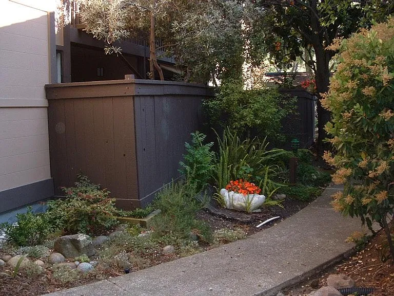 Outside of unit's patio on garden path to unit