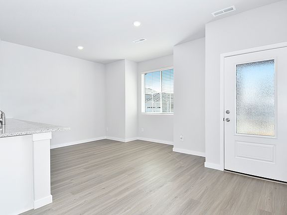 The family room is spacious and open to the kitchen.