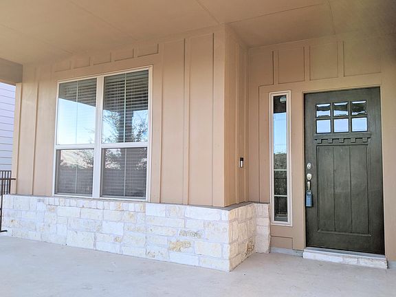 Enjoy the sunset from this welcoming front porch