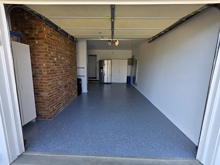 Attached garage leading to kitchen with Second Fridge