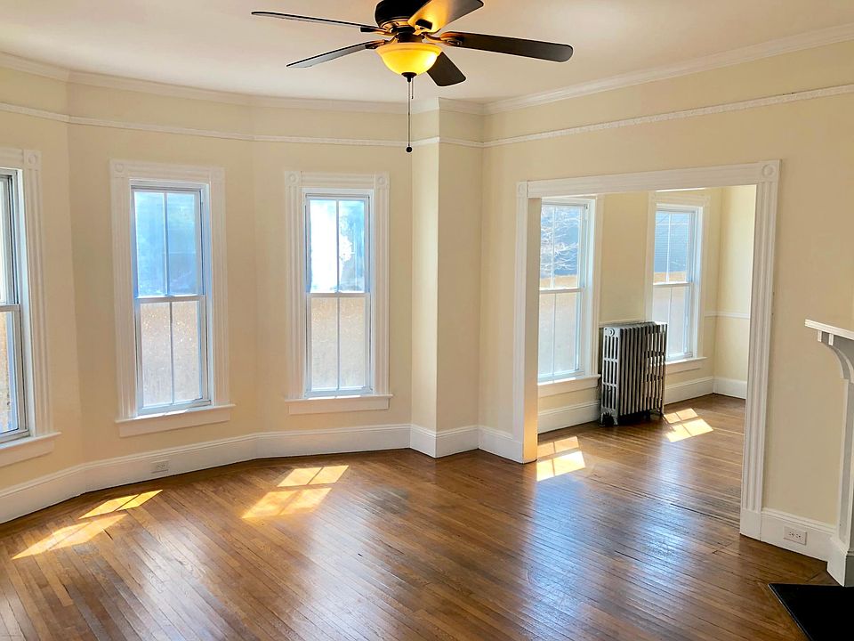 Living space with niche flooded with natural lighting.