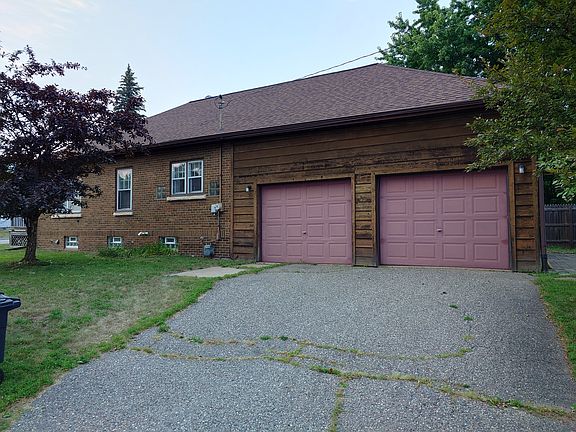 Exterior Side (Two Car Attached Garage)