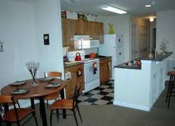 Kitchen with refrigerator, dishwasher, stove, oven, microwave and garbage disposal. All appliances come with 24 hr / 7 days a week maintenance contract.