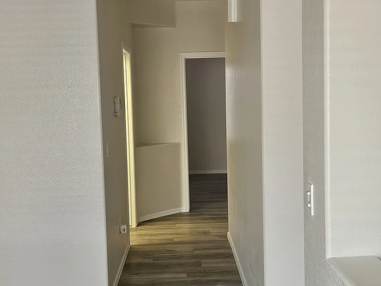 Hall Way to Bedrooms. Office on the left. Second Bedroom straight ahead.
