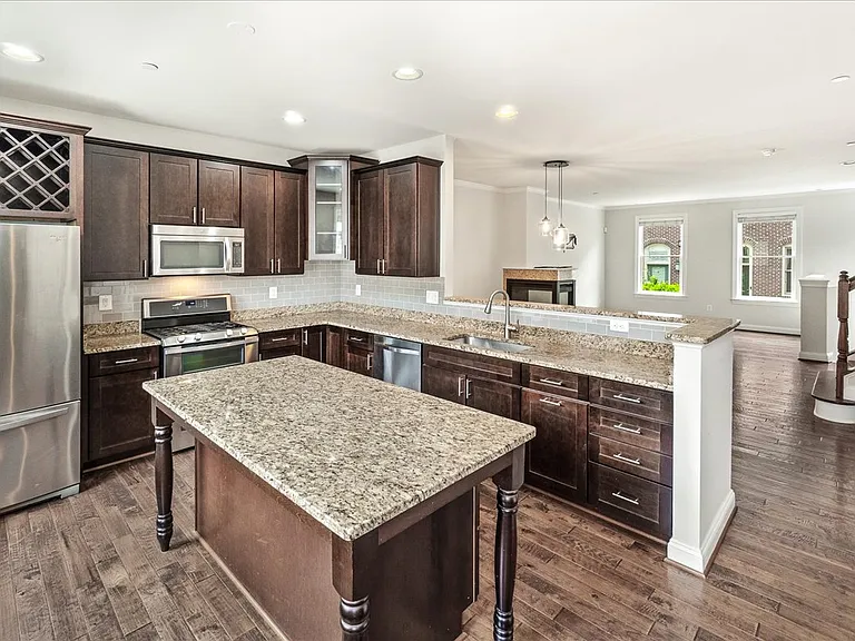 Gourmet Kitchen that opens up to Dining & Living Room