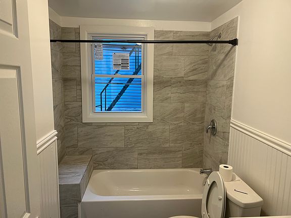 Renovated spacious bathroom.