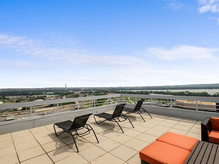 Rooftop deck with lounge chairs