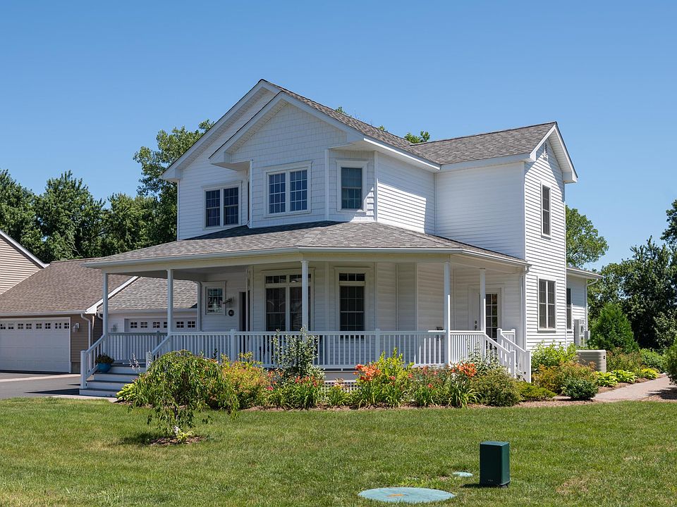 front of house with two car attached garage.