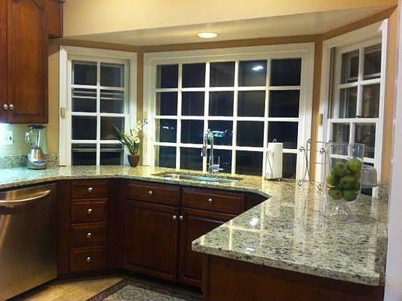 Kitchen with new cabinets/granite countertops/stainless steel appliances