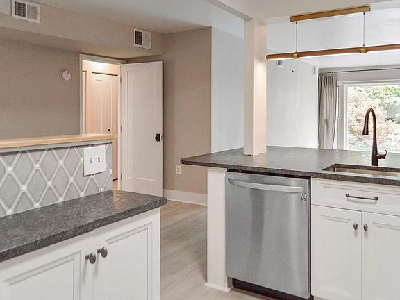 Deep sink, lots of storage cabinets, garbage disposal, under cabinet lighting