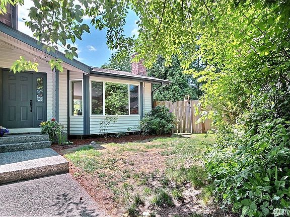 Lush and mature landscaping offers privacy and serenity.