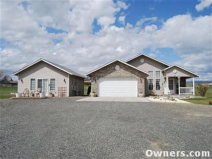 Separate guest house on the left with ample