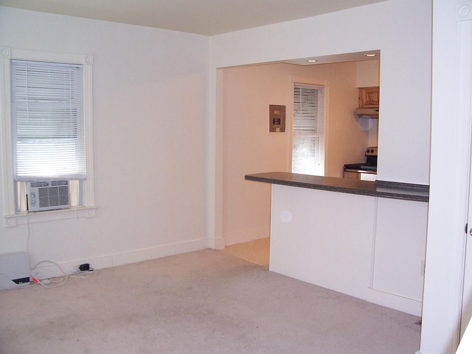 From living room looking toward the kitchen.Unit 's own breaker on kitchen wall